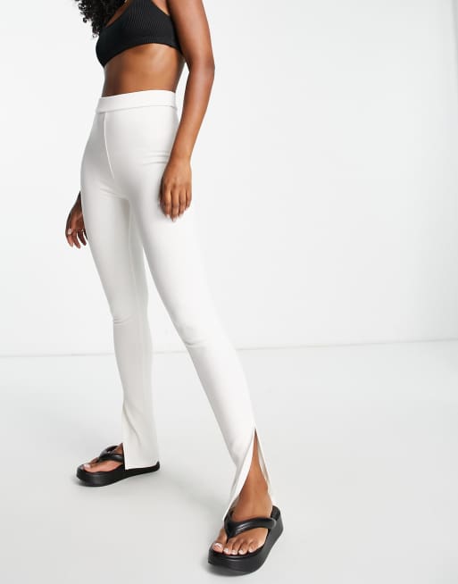 NA-KD split hem leggings in black