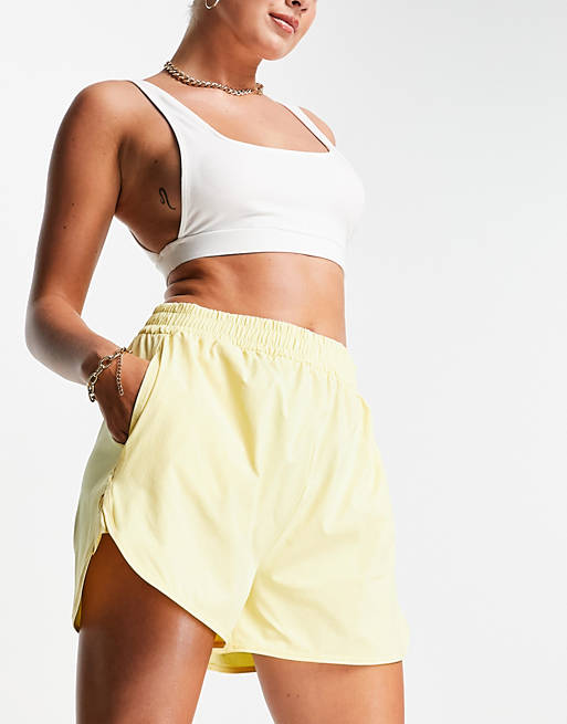 NA-KD sporty shorts in pastel yellow