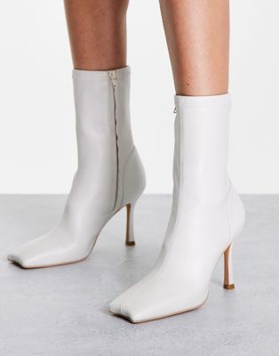 NA-KD square toe heeled boots in white