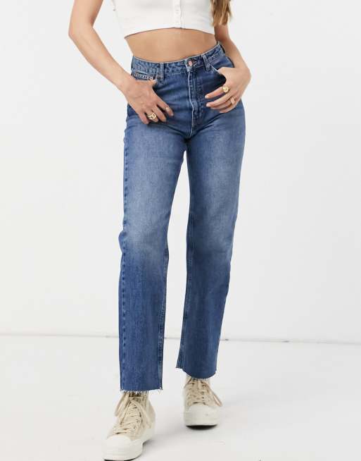 NA-KD straight leg raw hem jeans in mid blue | ASOS