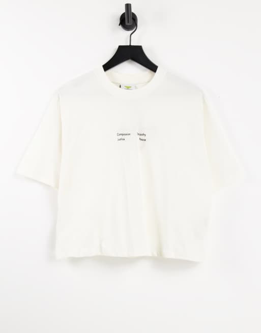 NA-KD - T-shirt crop top à imprimé Wonder Woman - Blanc cassé