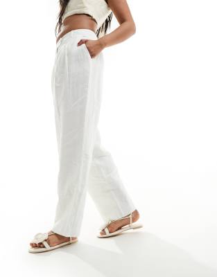 tailored linen pants in white - part of a set