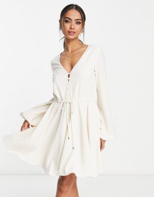 NA-KD x Anika Teller pleated mini dress in off white