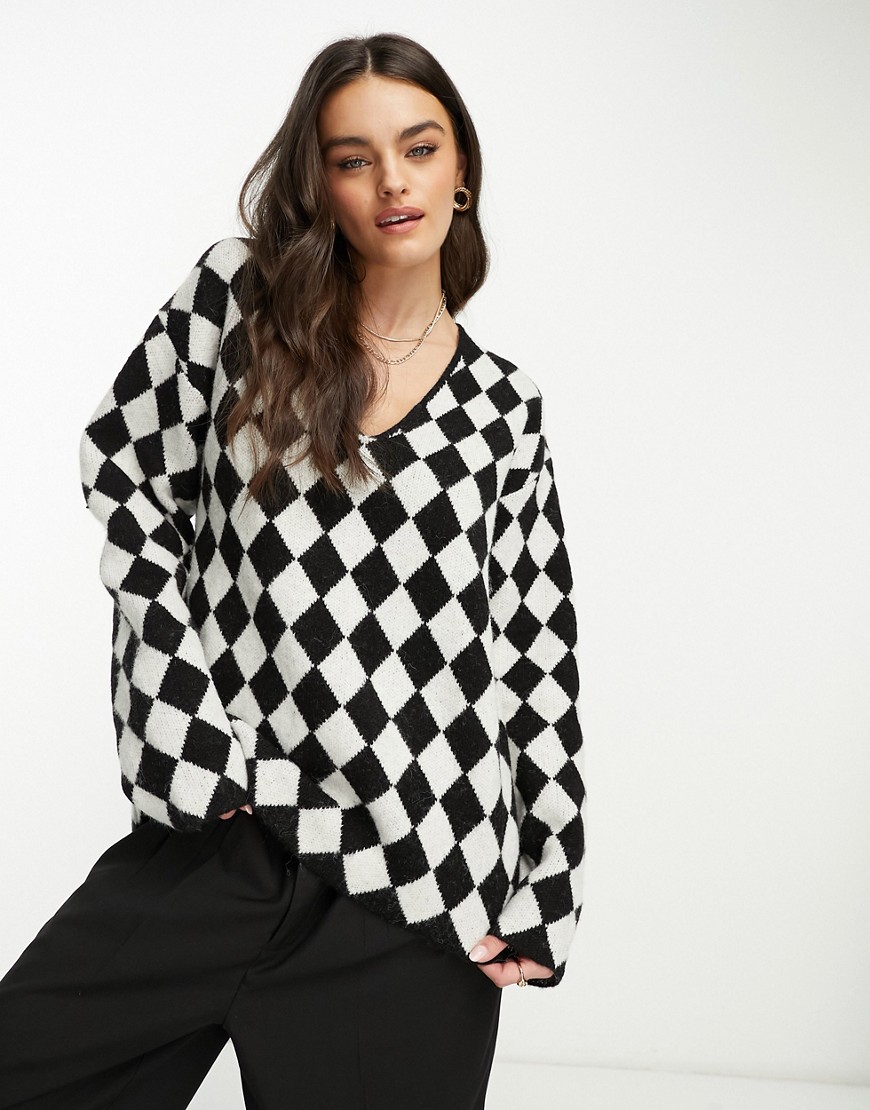 NA-KD x Annijor oversized sweater in black and white plaid