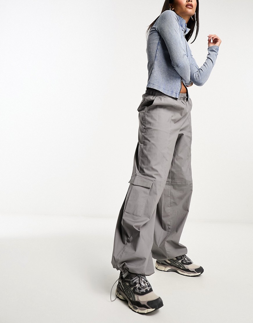 NA-KD x Chloe Schuterman loose fir cargo trousers in grey