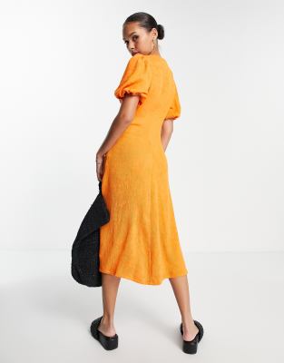 NA-KD X Femmeblk puff sleeve midi dress in orange