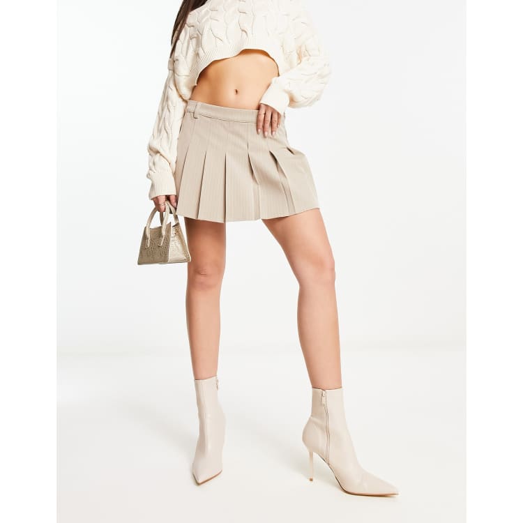 Beige Pleated Silk Mini Skirt with Leg Warmers Outfits (1 ideas & outfits)