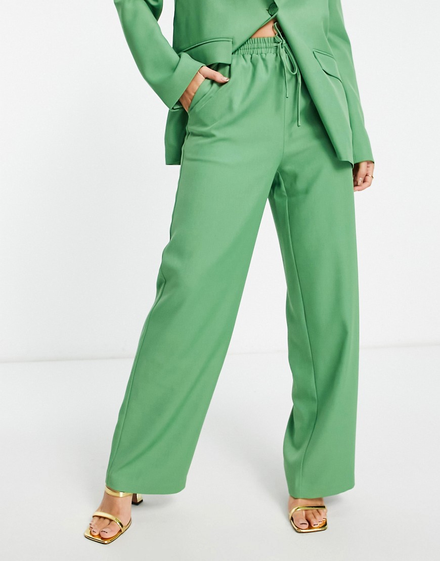 NA-KD x Klara Montes co-ord classic trousers in green