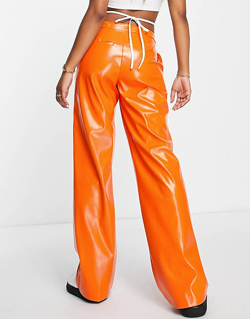 NA-KD x Melissa Bentsen faux leather wide leg pants in orange