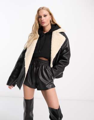 NA-KD x Mimi AR faux leather aviator jacket with faux fur in black