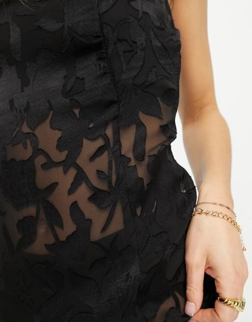 NA-KD x Mimi A.R. strap detail 90s midi dress in black floral