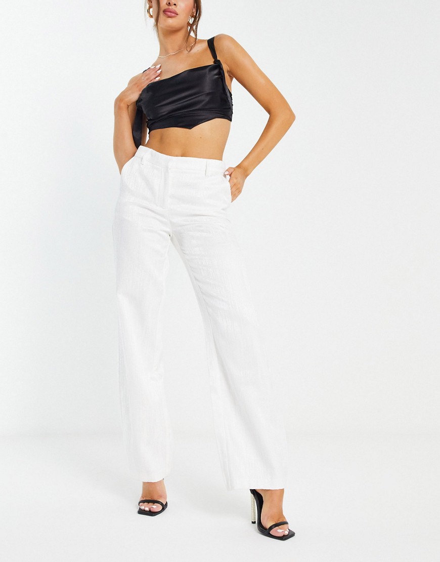 NA-KD x Moa Mattson tailored trousers in textured shine co-ord-White