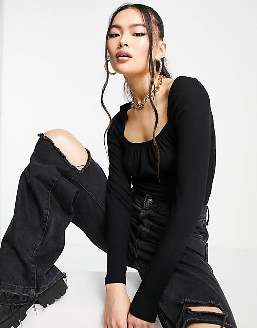 Tops NA-KD X Pamela ruched front long sleeve top in black 