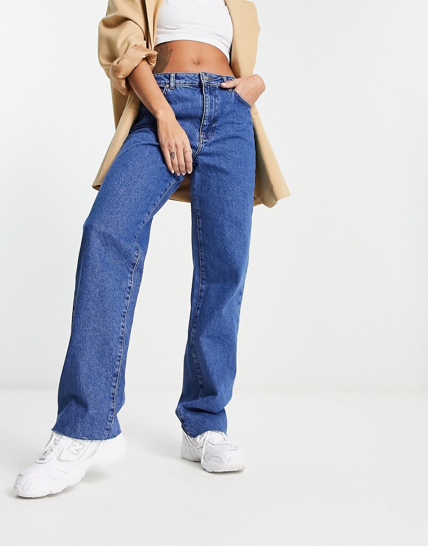 NA-KD x Rianne Meijer straight jeans with raw him in blue wash