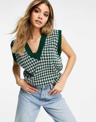 green knitted vest