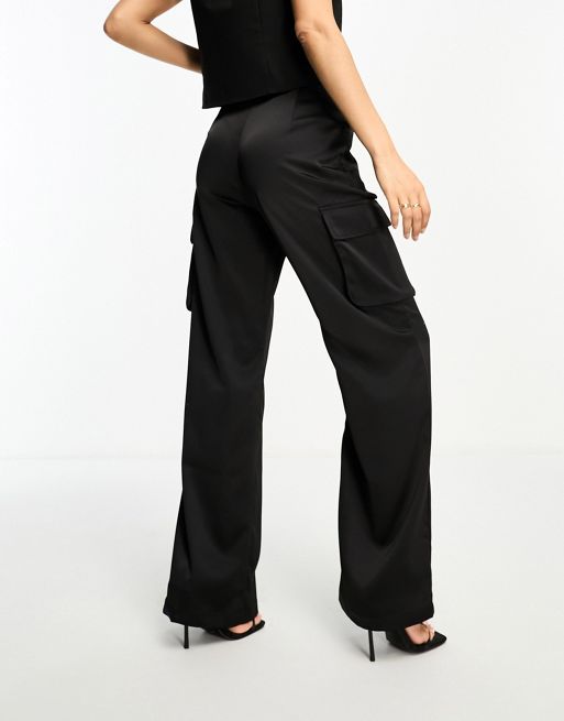 ASOS DESIGN Petite faux leather high waist flare pants in black