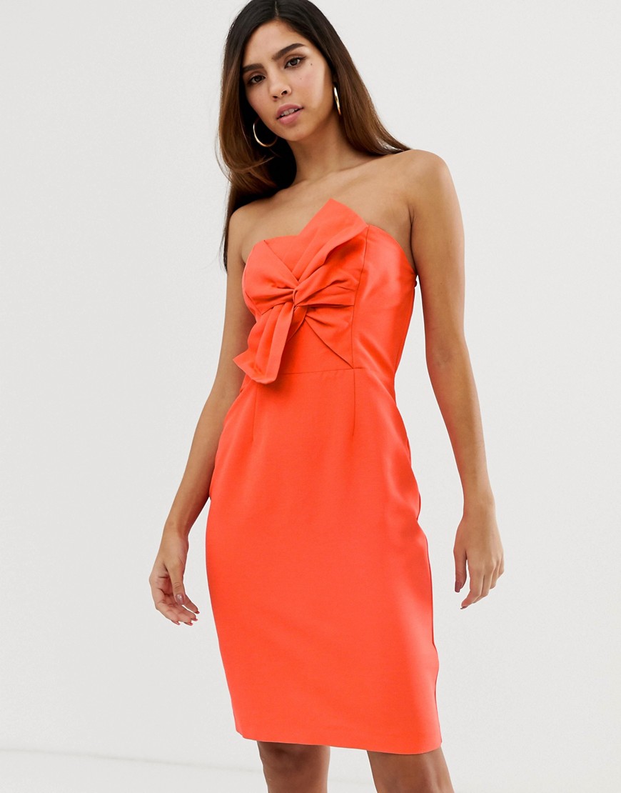 Naf Naf – Fodralklänning med stor rosett på bröstet-Orange