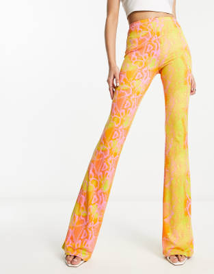 Shop Naked Wardrobe High Waist Flared Pants In Neon Snake Print-multi