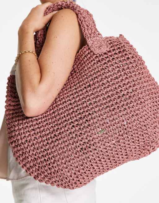 Nali – Rosa axelväska i raffia
