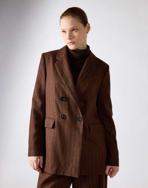 Narrated Double-breasted pinstripe blazer in brown stripe - view 1