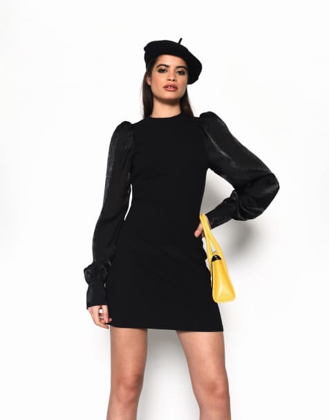 Narrated High neck puff sleeve mini dress in black