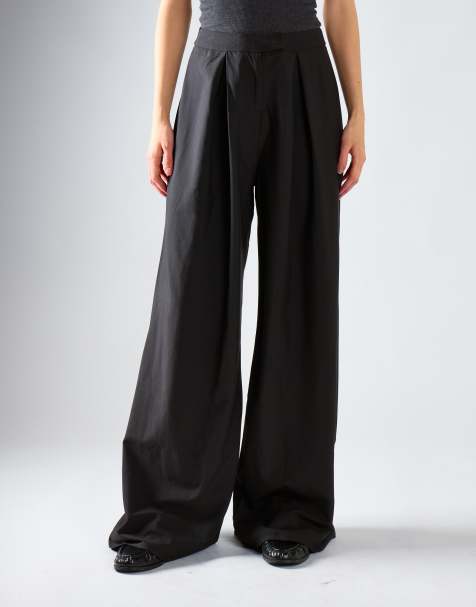 Narrated High-waisted wide-leg trousers in black - view 1