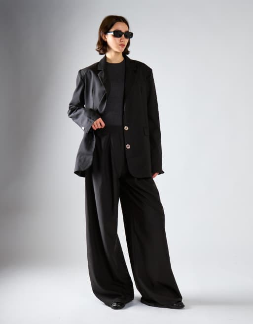 Narrated High-waisted wide-leg trousers in black, 2 of 4