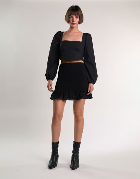 Narrated Long-puff-sleeve-tie-detail crop-top in black