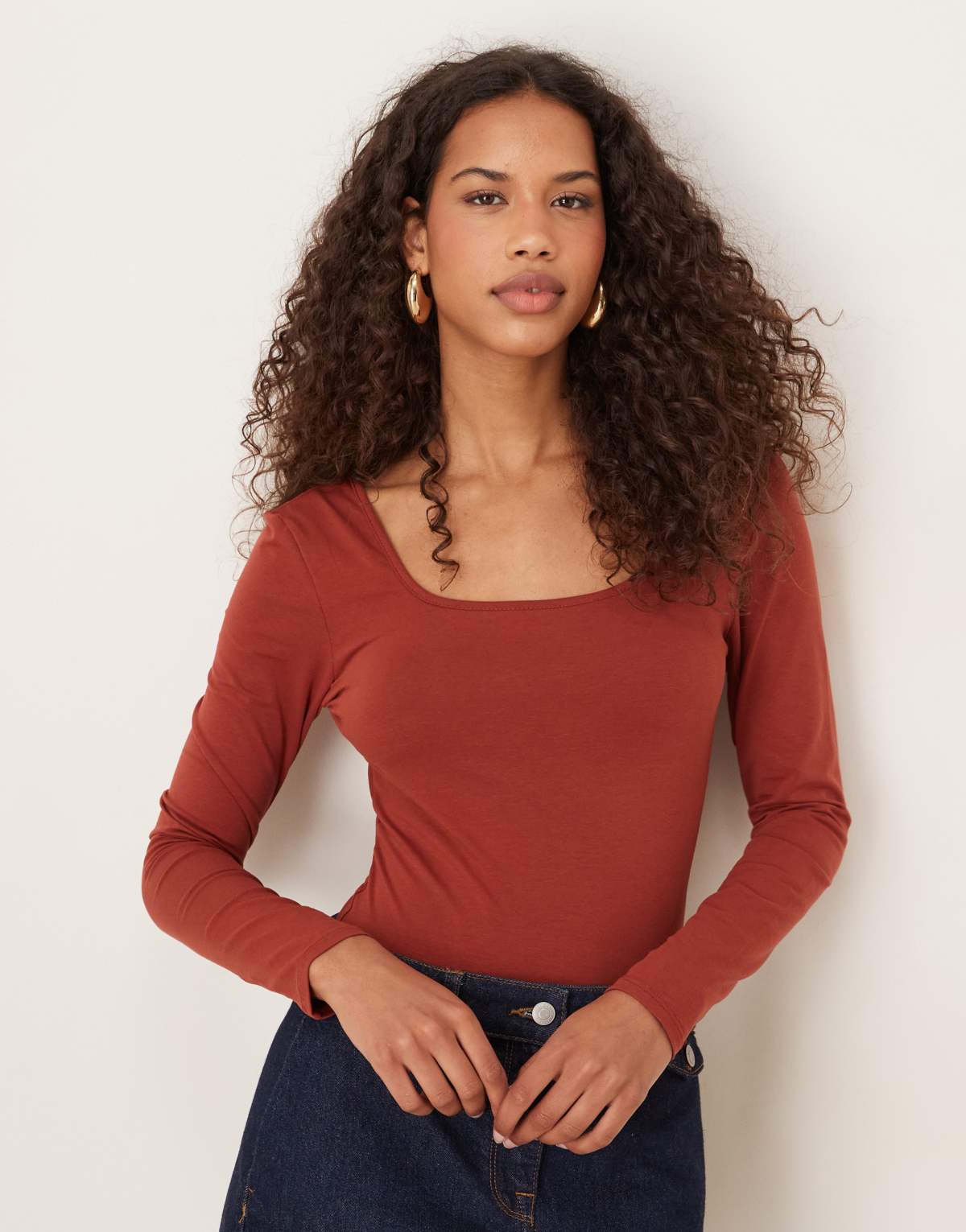 Narrated Long sleeve bodysuit with rounded square neck in umber