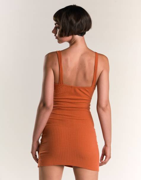 Narrated Ribbed bodycon sleeveless mini dress in rust - view 1