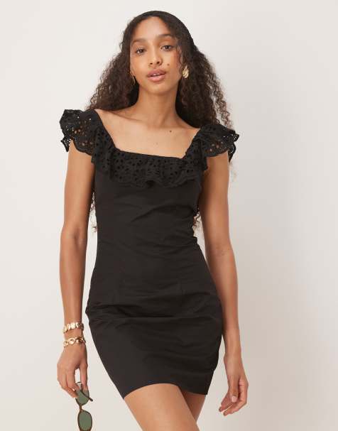 Narrated Ruffle neck mini dress in black - view 1