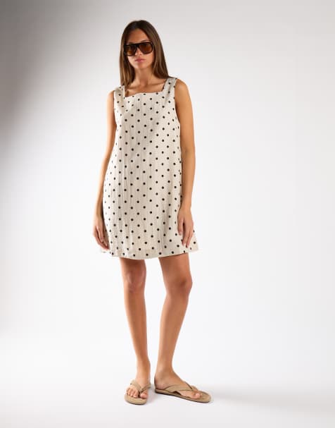 Narrated Sleeveless a line mini dress in natural black spot - view 1