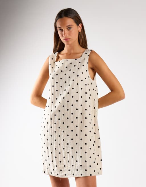 Narrated Sleeveless a line mini dress in natural black spot, 2 of 4