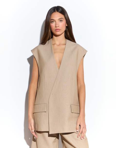 Narrated Sleeveless blazer in sand - view 1