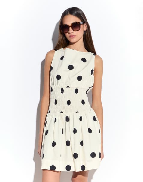 Narrated Smocked waist mini dress in cream spot - view 1