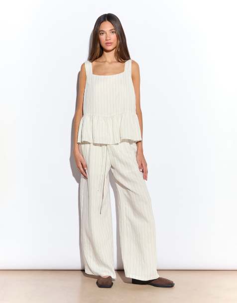 Narrated Square neck peplum top in cream pinstripe