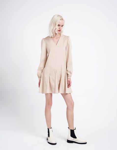 Narrated V neck long sleeves pleated mini dress in stone