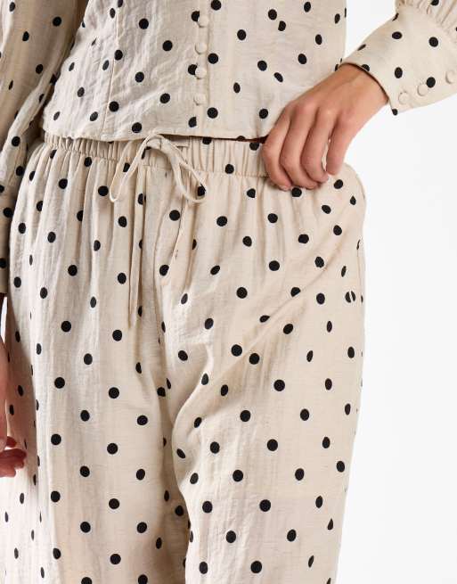 Narrated Wide-leg trousers in natural black spot, 2 of 4