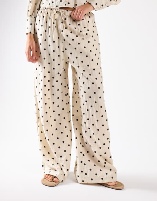 Narrated Wide-leg trousers in natural black spot, 3 of 4