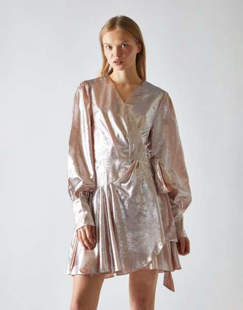 Narrated Wrap mini dress with puff long sleeves in peach metallic