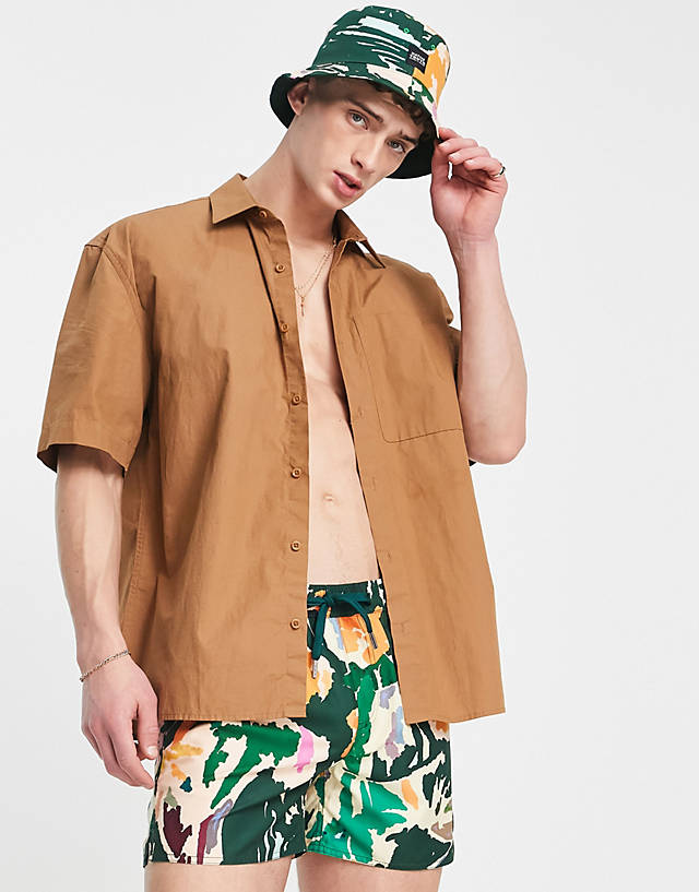 Native Youth - bucket hat and swim shorts co-ord in green tropical print