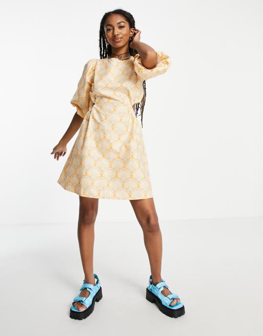Native Youth cut out waist puff sleeve mini smock dress in retro shell print