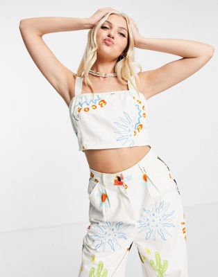 Native Youth denim corset with contrast stitching in mix print co-ord