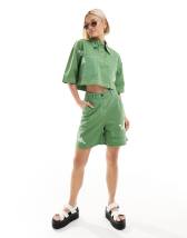 adidas Originals Adilenium denim capri shorts in lime wash