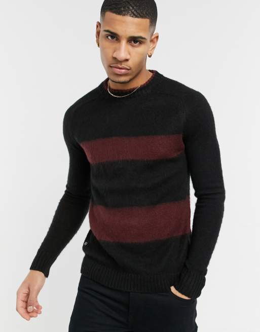 Black jumper shop with red stripe