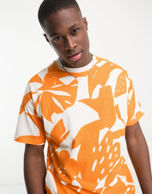 Native Youth – Pomarańczowy plażowy T-shirt w graficzny wzór