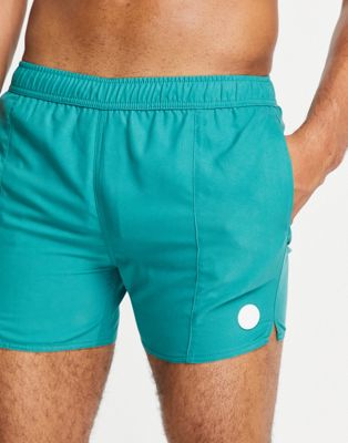 Native Youth swim shorts in teal