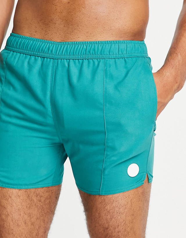Native Youth - swim shorts in teal