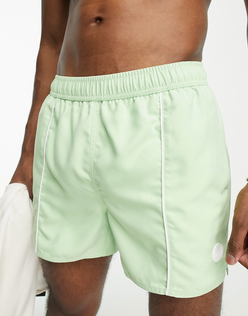 swim shorts with piped seam in green - MGREEN