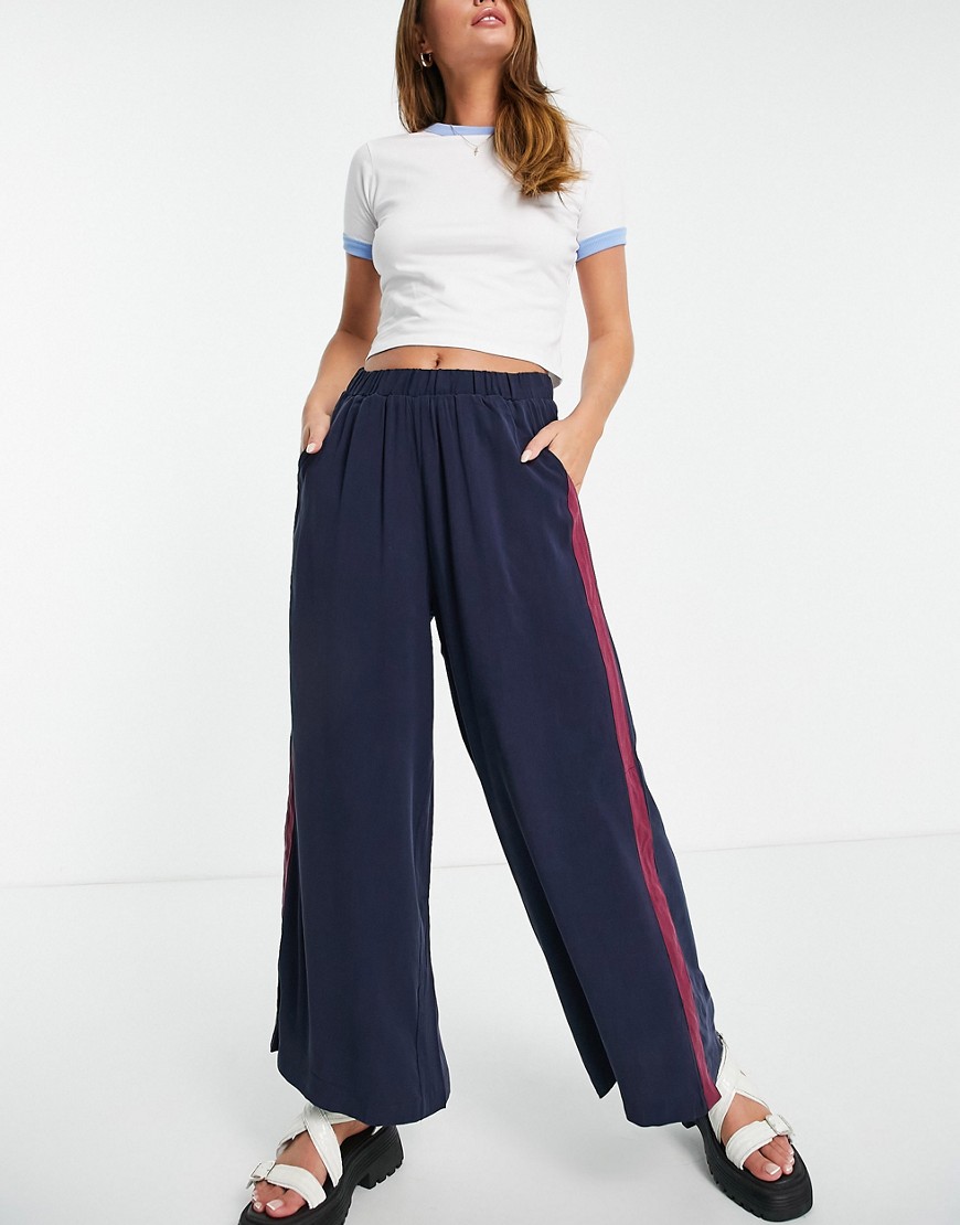Native Youth wide leg pants in navy with side stripe and snap detail-Blues